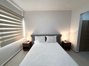 1 dormitorio, tabla de planchar con plancha, wifi gratis y ropa de cama