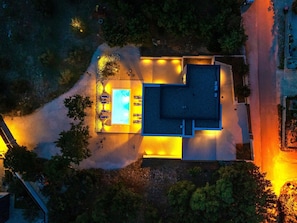 An aerial view of a house with a swimming pool, a covered patio, and a large garage. - Green & Blue by Interhome (Maslenica)