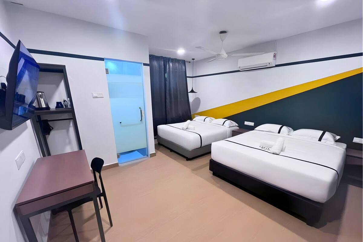 Familiekamer | Een bureau, een strijkplank/strijkijzer, gratis wifi, beddengoed