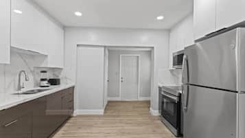 Fridge, microwave, oven, cookware/dishes/utensils