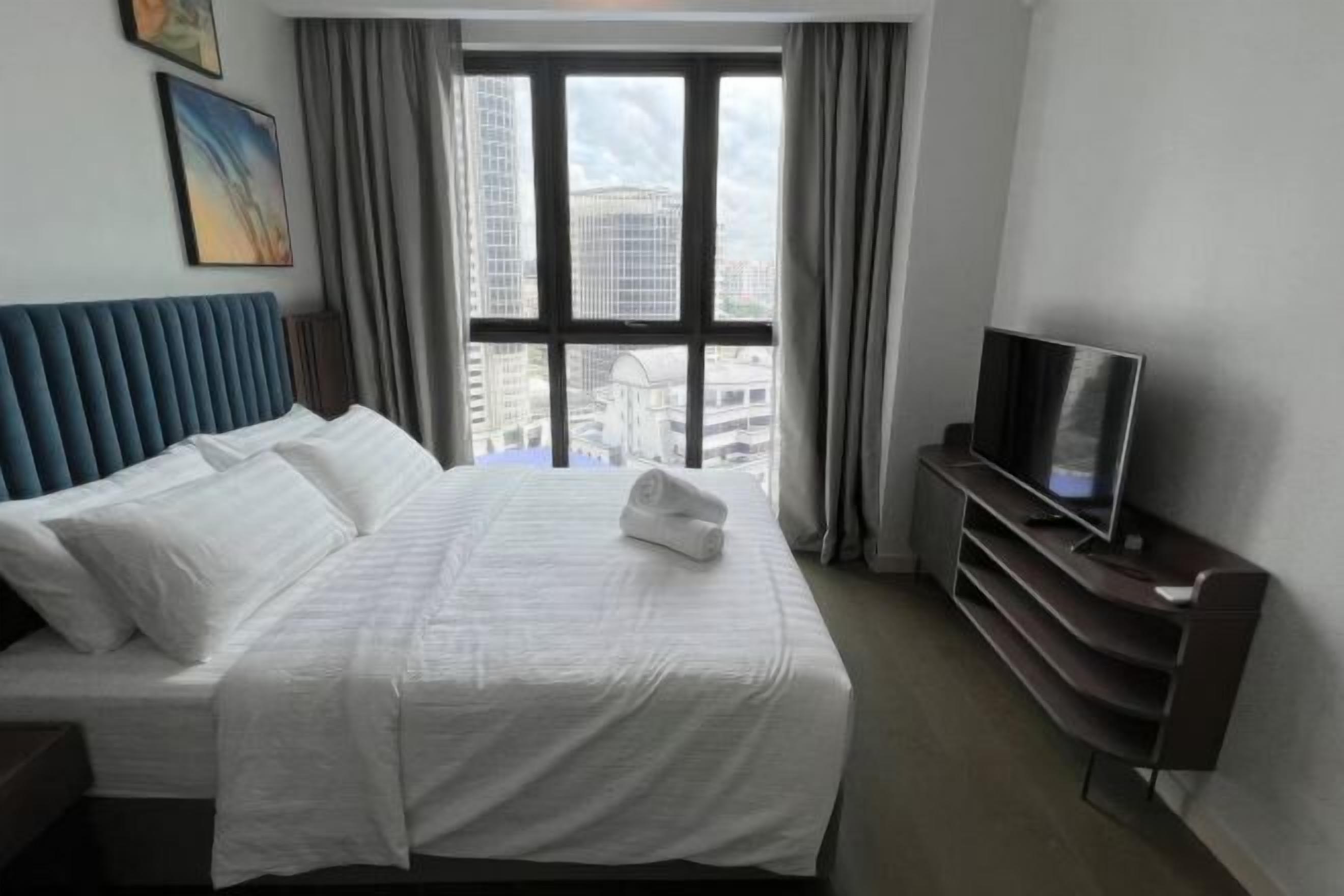 Desk, laptop workspace, free WiFi, bed sheets