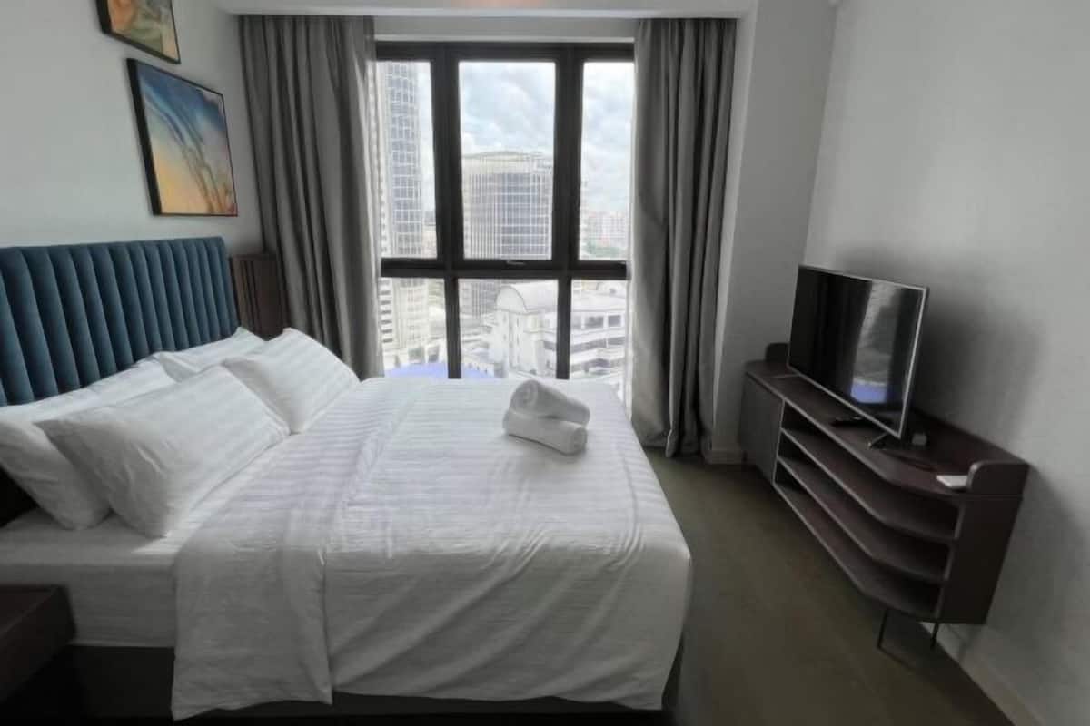 Desk, laptop workspace, free WiFi, bed sheets