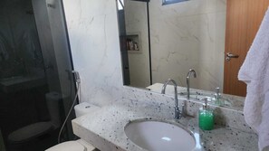 Hair dryer, towels, soap, toilet paper