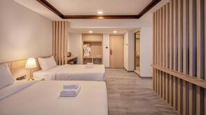 Family Suite Room | Cortinas opacas, wifi gratis, ropa de cama