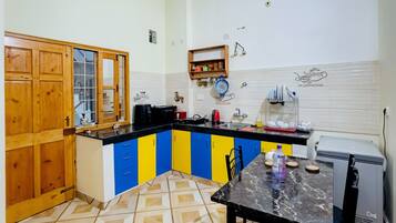 Microwave, coffee/tea maker, electric kettle, cookware/dishes/utensils