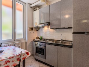 Fridge, microwave, oven, cookware/dishes/utensils