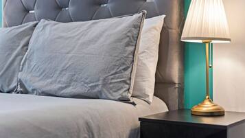 1 bedroom, desk, iron/ironing board, travel crib