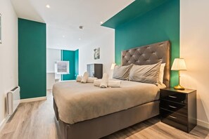 1 bedroom, desk, iron/ironing board, travel cot