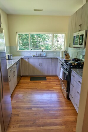 Microwave, toaster, dining tables