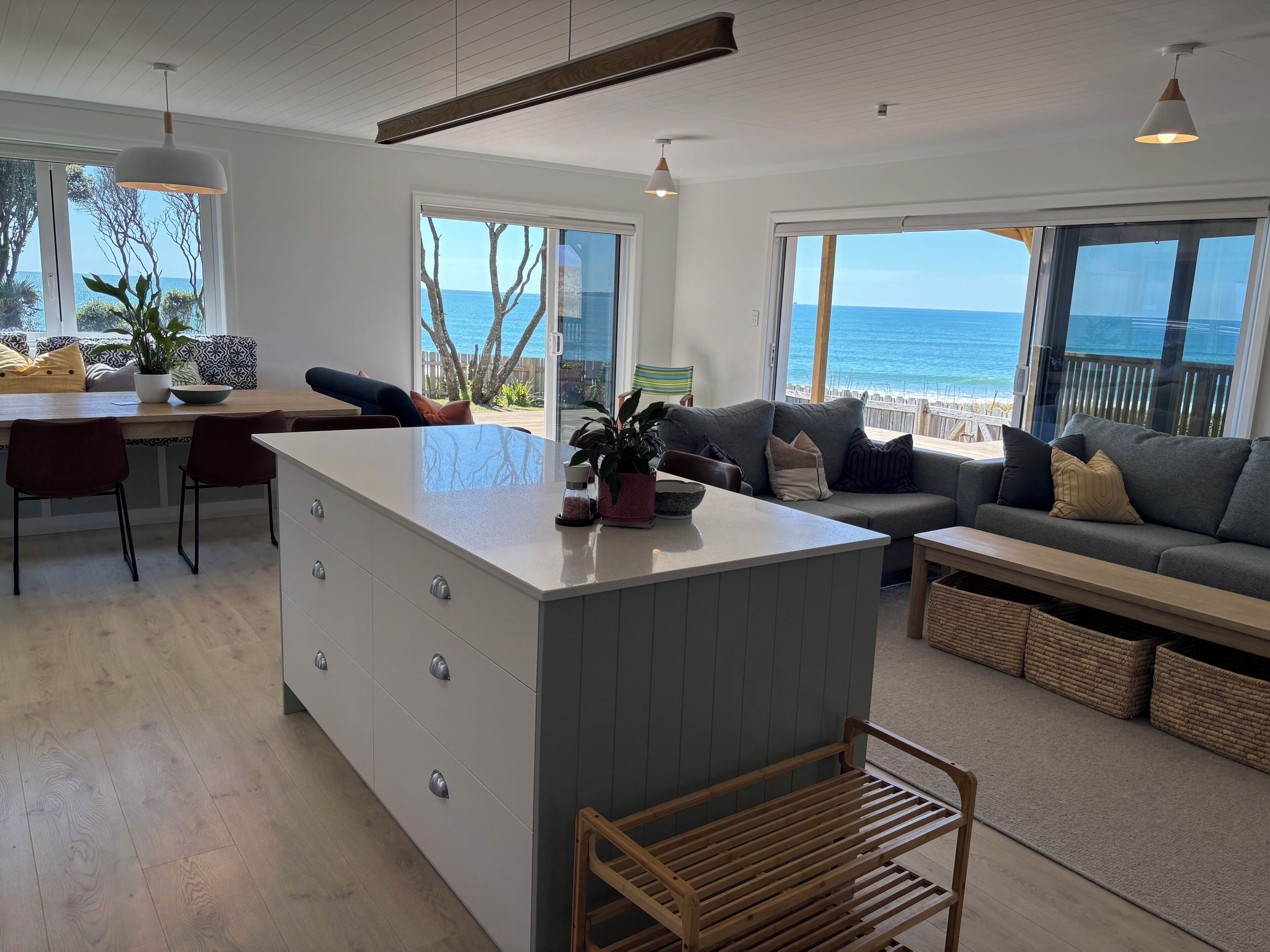 Our recent reno saw walls knocked down to allow sea views from every window.