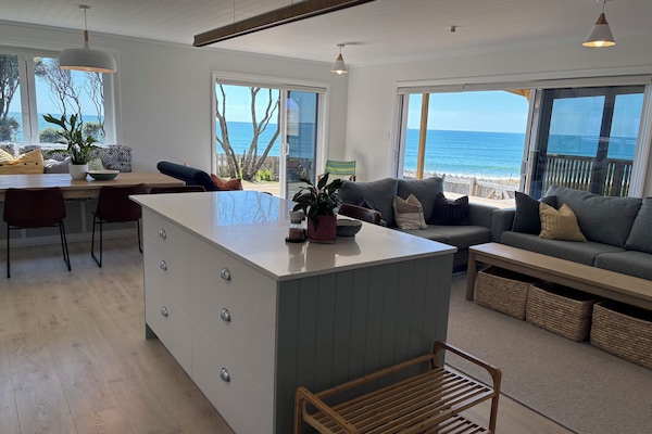 Our recent reno saw walls knocked down to allow sea views from every window.