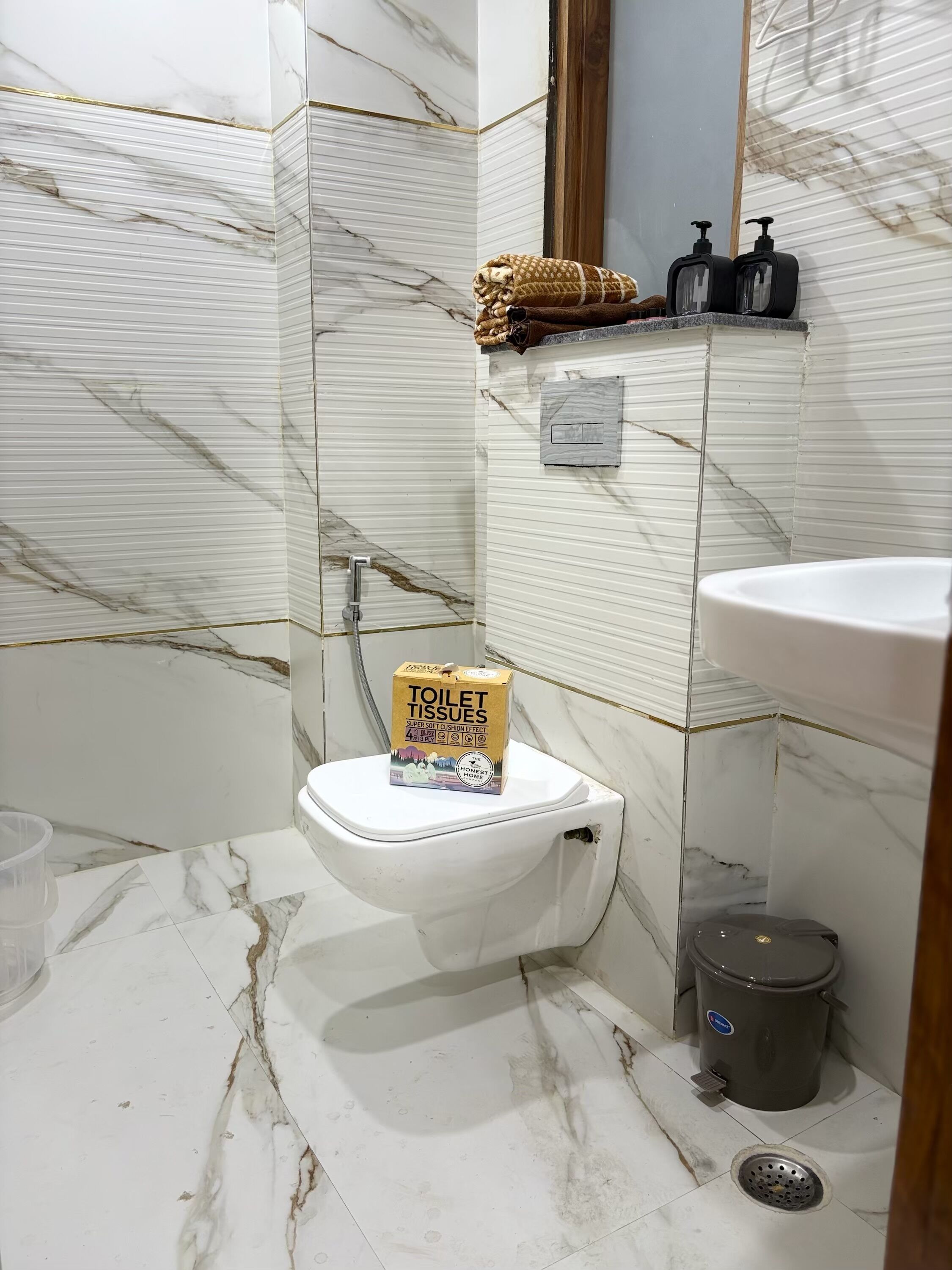 Shower, bidet, towels, soap