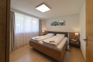 1 bedroom, desk, iron/ironing board, travel cot