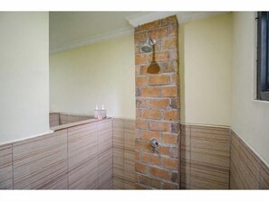 Deluxe with Bathtub | Bathroom shower
