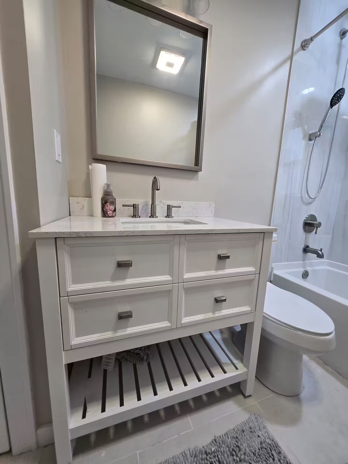 Hair dryer, towels, soap, shampoo