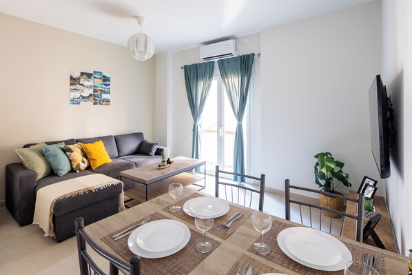 Apartment, 1 Bedroom, Kitchen, City View | Living room | 53-inch Smart TV with digital channels, streaming services