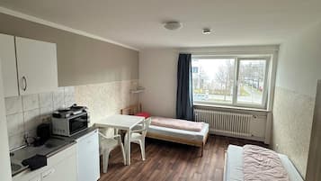 Twin Room | Individually furnished, iron/ironing board, free WiFi, bed sheets