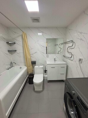 Serviettes fournies, savon, papier de toilette