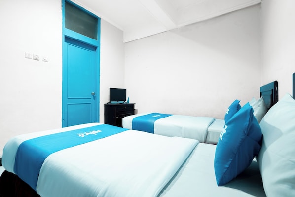 Chambre avec lits jumeaux | Bureau, Wi-Fi gratuit, draps fournis