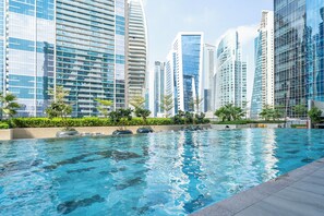 Outdoor pool - bnbme - DAMAC Zada Tower - 1 BDR (Dubai)