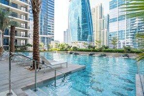 Outdoor pool - bnbme - DAMAC Zada Tower - 1 BDR (Dubai)