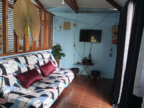 House, 1 Bedroom, Accessible, Smoking | Living room | Books - Oceanfront Guest House (Puerto Galera)
