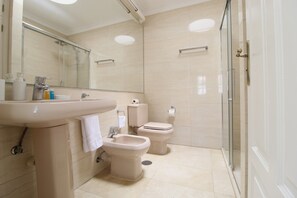 Hair dryer, bidet, towels, soap