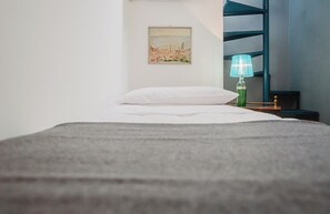 Down comforters, iron/ironing board, bed sheets