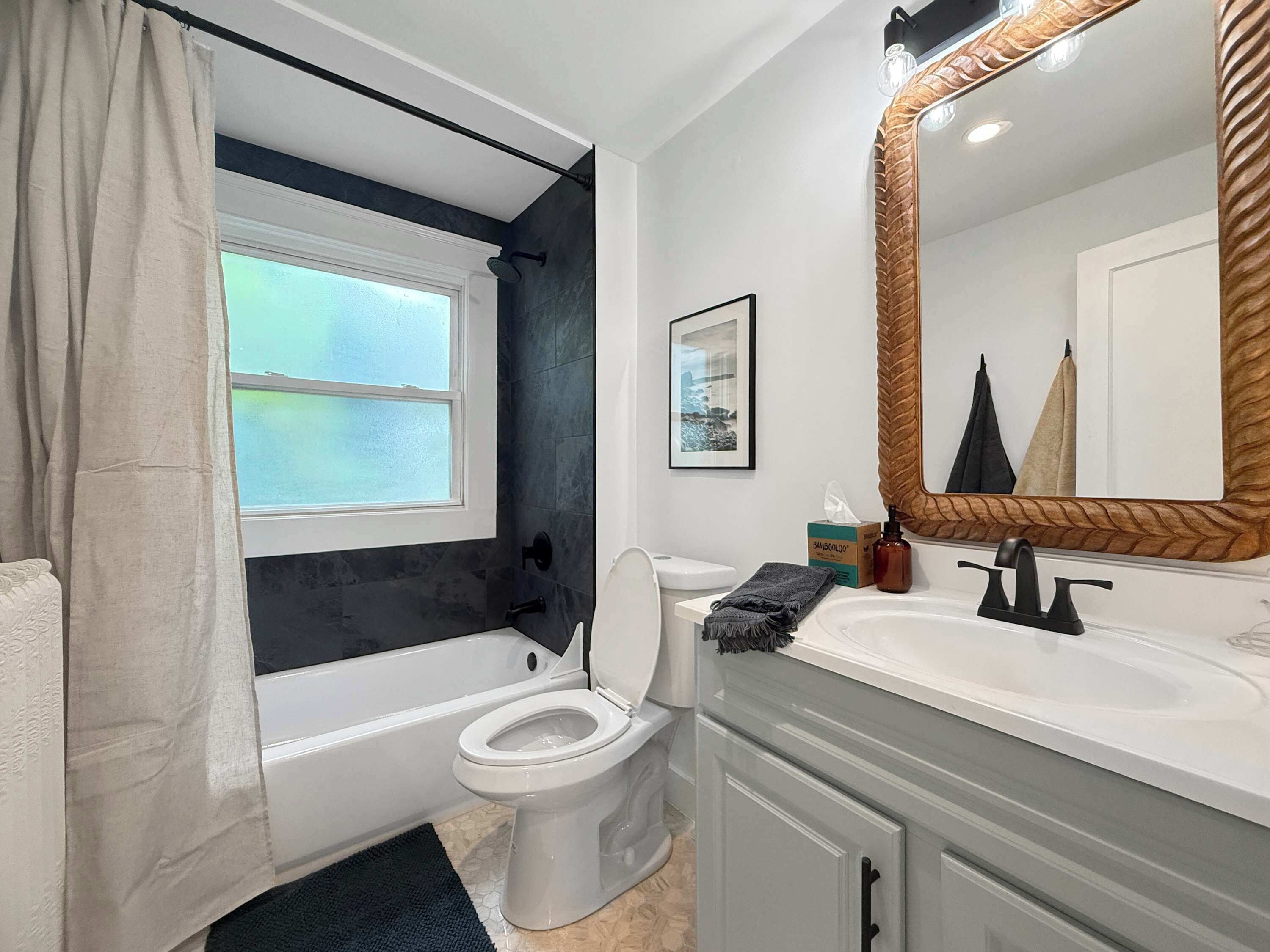 Shower, hair dryer, towels, shampoo