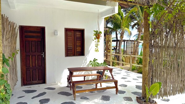 Superior Triple Room, Sea View | Living area