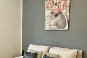 2 chambres, fer et planche à repasser