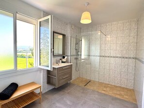 Shower, hair dryer, towels, soap