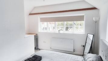 Blackout curtains, iron/ironing board, free WiFi