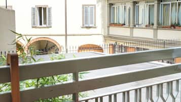 Habitación doble clásica, 2 camas individuales, vista al patio | Terraza o patio