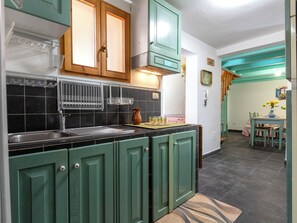 Fridge, microwave, cookware/dishes/utensils