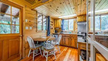 Oven, toaster, cookware/dishes/utensils, dining tables