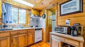Oven, toaster, cookware/dishes/utensils, dining tables