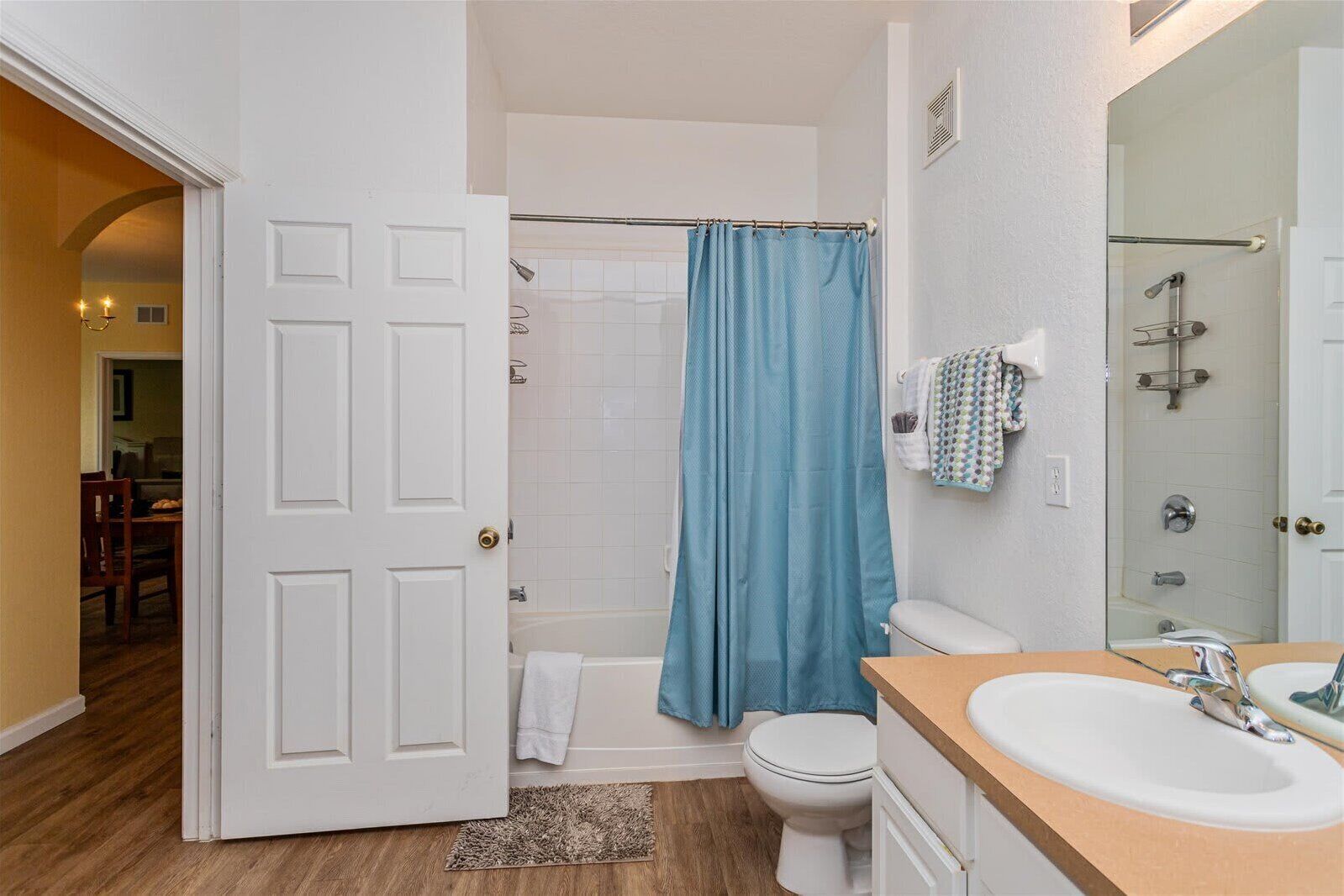 Shower, hair dryer, towels, shampoo