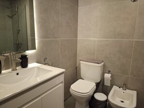 Hair dryer, towels, soap, toilet paper