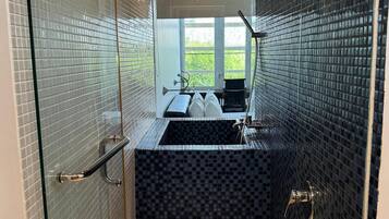 Eco-friendly toiletries, hair dryer, bidet, towels