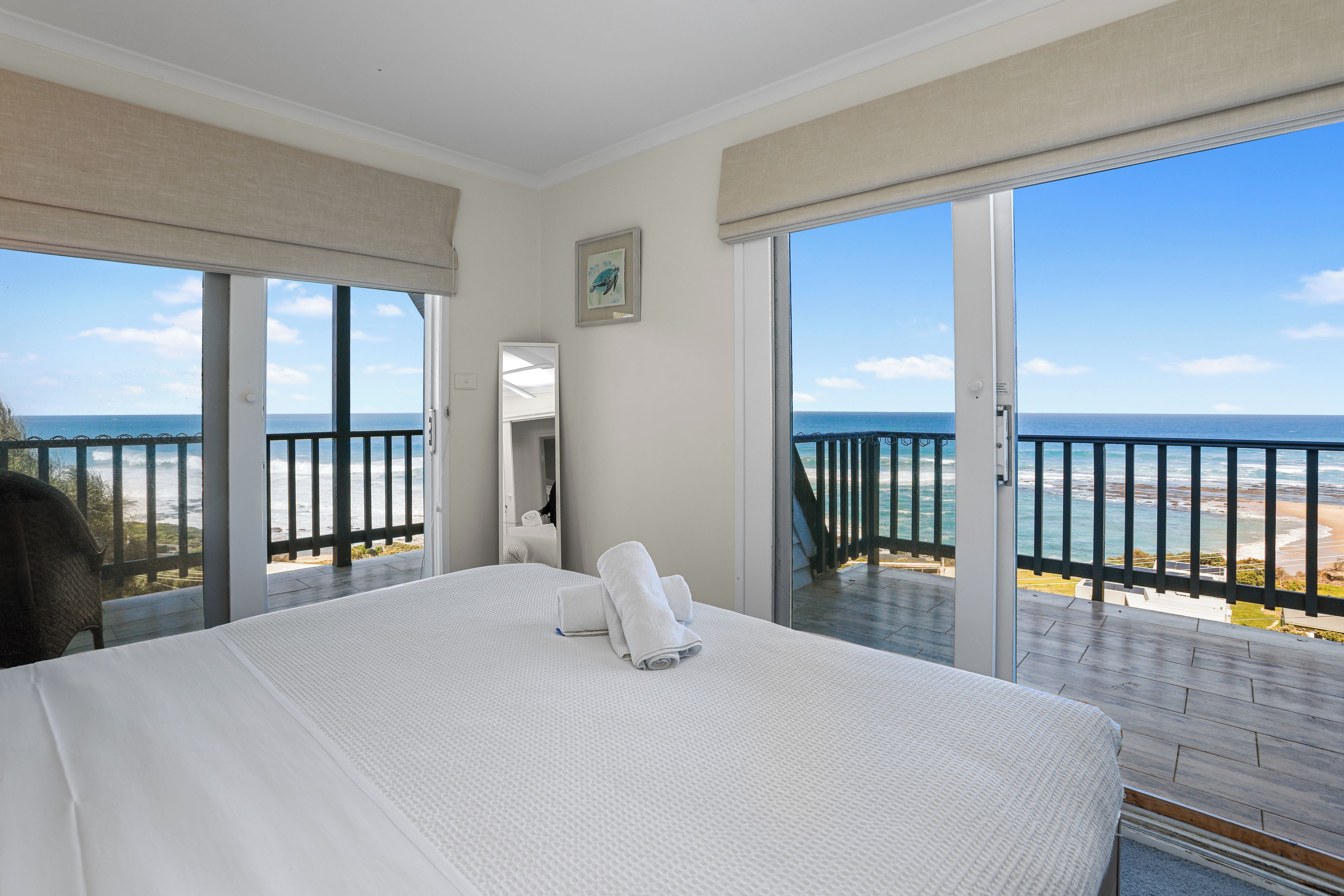 Wake up to sweeping Southern Ocean views from your king bed and two private balconies.