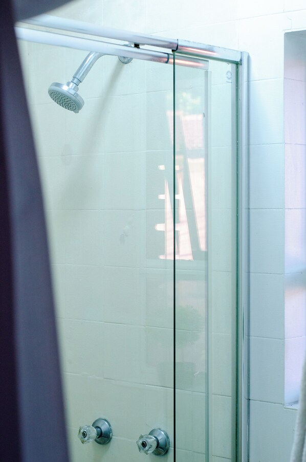 Shower, hair dryer, towels, soap