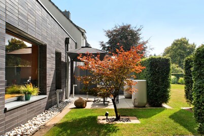 Moderno apartamento vacacional con terraza y jardín compartidos y wifi
