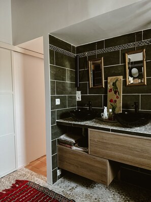 Shower, hair dryer, towels, toilet paper