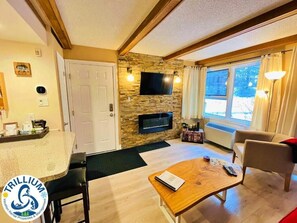 Apartment, 1 Queen Bed with Sofa bed, Non Smoking, Pets not allowed | Living area | 43-inch Smart TV with cable channels, fireplace