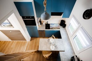 Ovn, kokeplater og oppvaskmaskin