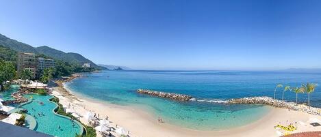 On the beach, sun loungers, beach towels