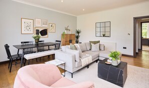 Basic Apartment | Living area | 27-inch Smart TV with cable channels