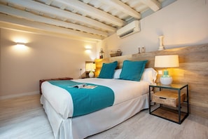 Apartamento (3 Bedrooms) | 1 quarto, escrivaninha, ferros/tábuas de passar roupa, Wi-Fi de cortesia