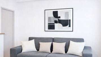 Superior Apartment, Courtyard View | Living area | 80-cm Smart TV with digital channels